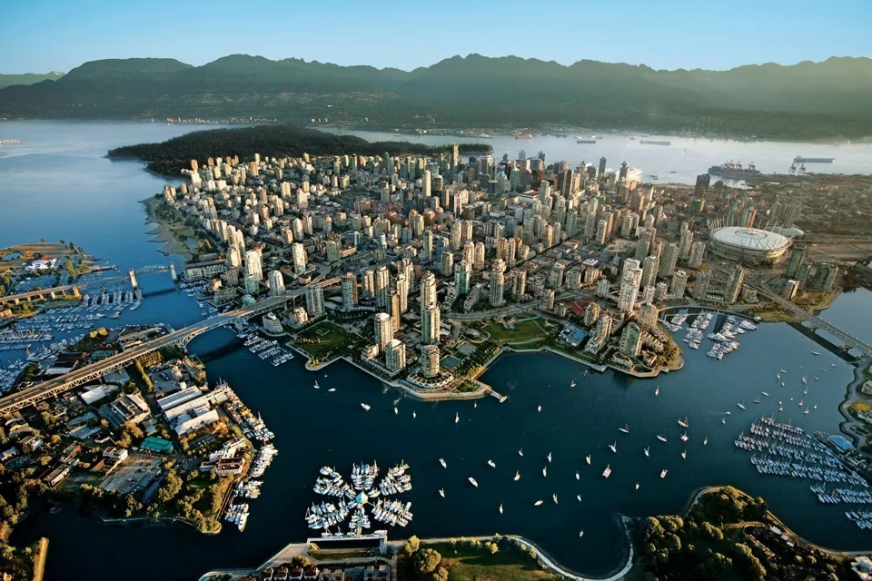 Aerial view of Vancouver’s harbour, city, and North Shore mountains
